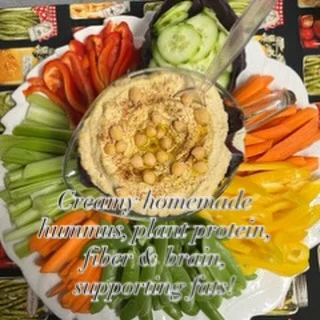 This homemade hummus and crunchy veggies supports hormones, digestion, and sustained energy. Healthy snacking that works with your body, not against it. Small swaps like this create big change overtime and I’m here to guide you every step of the way. #healthyeating #healthylivingtips #healthysnacks #healthcoach #womenshealth